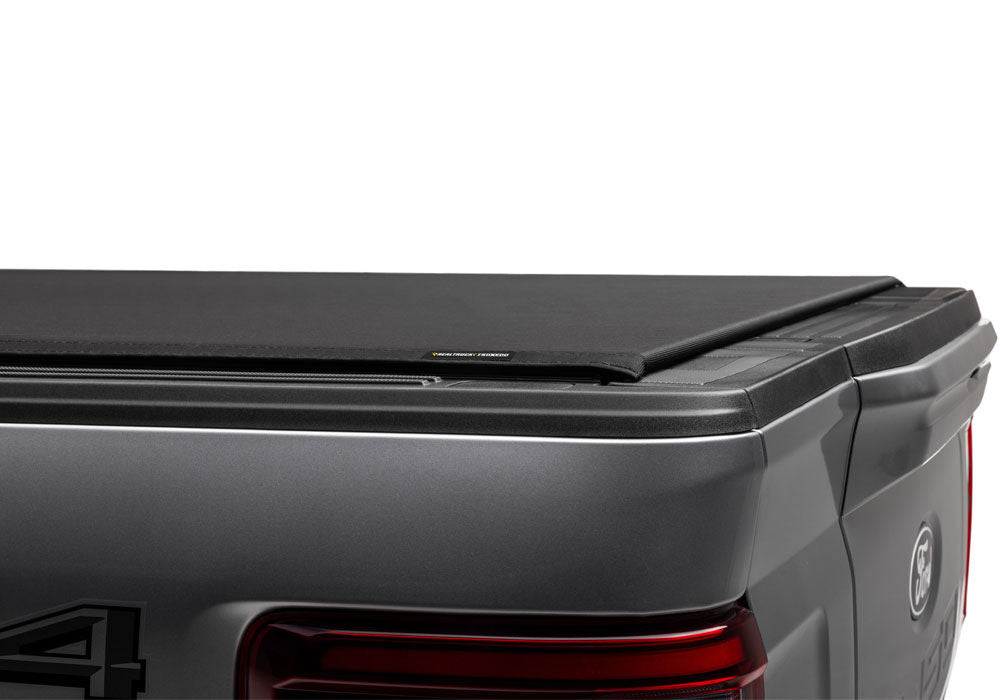 Pro X15 Tonneau Cover Black 2015-2025 Ford F-150 5 Foot 7 Inch Bed (Includes Lightning) Truxedo