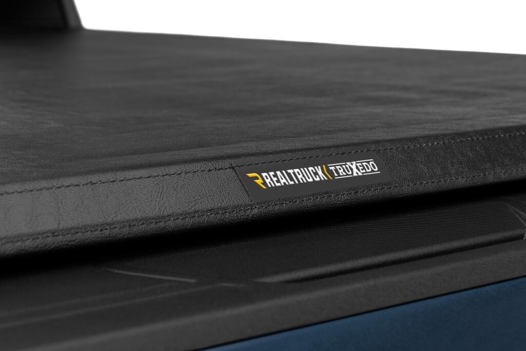 TruXport Tonneau Cover Black 2020-2026 Silverado/Sierra 2500 HD/3500 HD 6 Foot 9 Inch Bed Truxedo